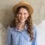 https___elements.envato.com_young-attractive-stylish-woman-sitting-at-wall-bac-T34CKY3-1.jpg